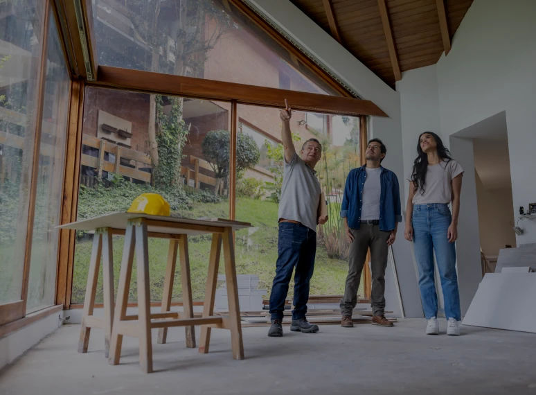 Architect discussing plans with clients